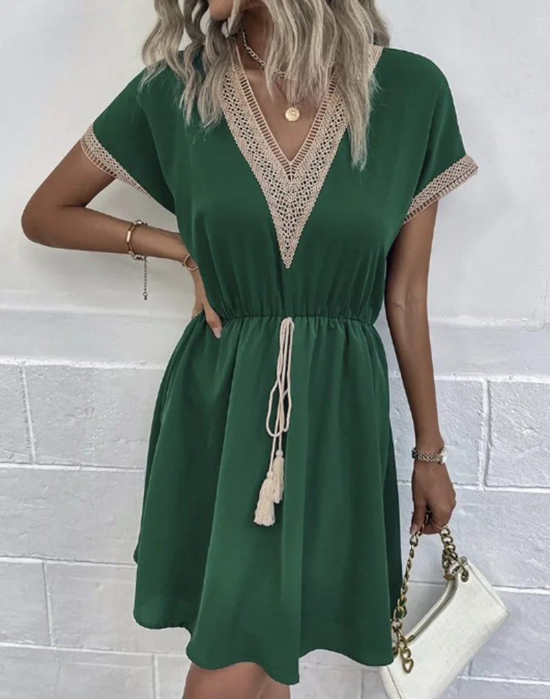 Women's boho flowy draped dress with elegant V-neckline, waist-defining tie, casual chic silhouette