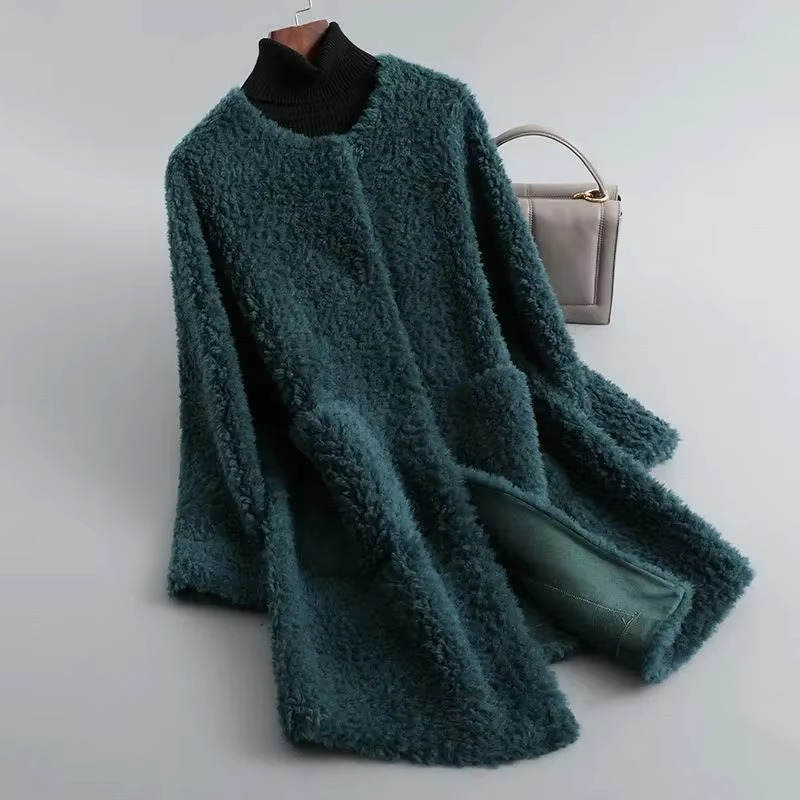 Women's mid-length plush faux lamb fur coat in neutral tones with cozy cardigan-style silhouette