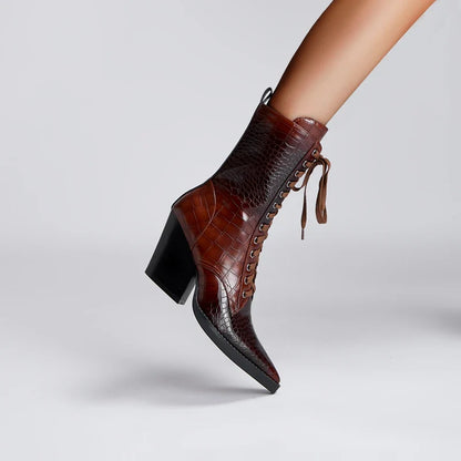 Women's black crocodile-embossed leather lace-up Western boots with pointed toe