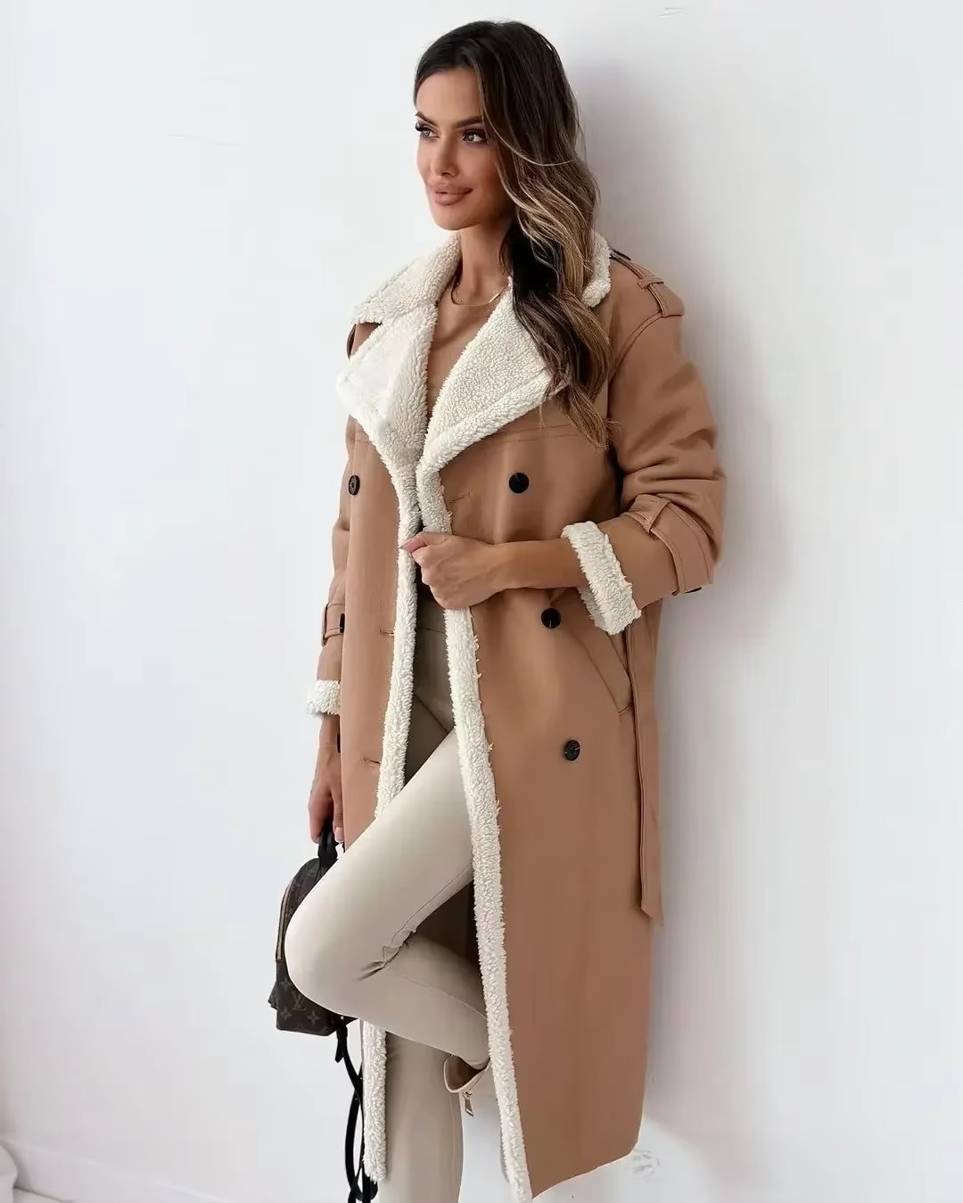 Women's black PU leather double-breasted trench coat with stand collar and warm plush lining