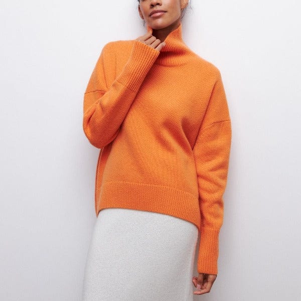 Oversized wool-blend turtleneck sweater with high ribbed neck in relaxed cozy fit