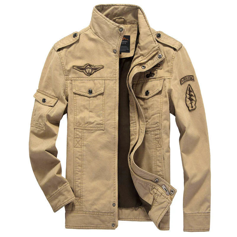 Men's olive cargo jacket structured cotton field coat with wind-resistant utility pockets for outdoor wear