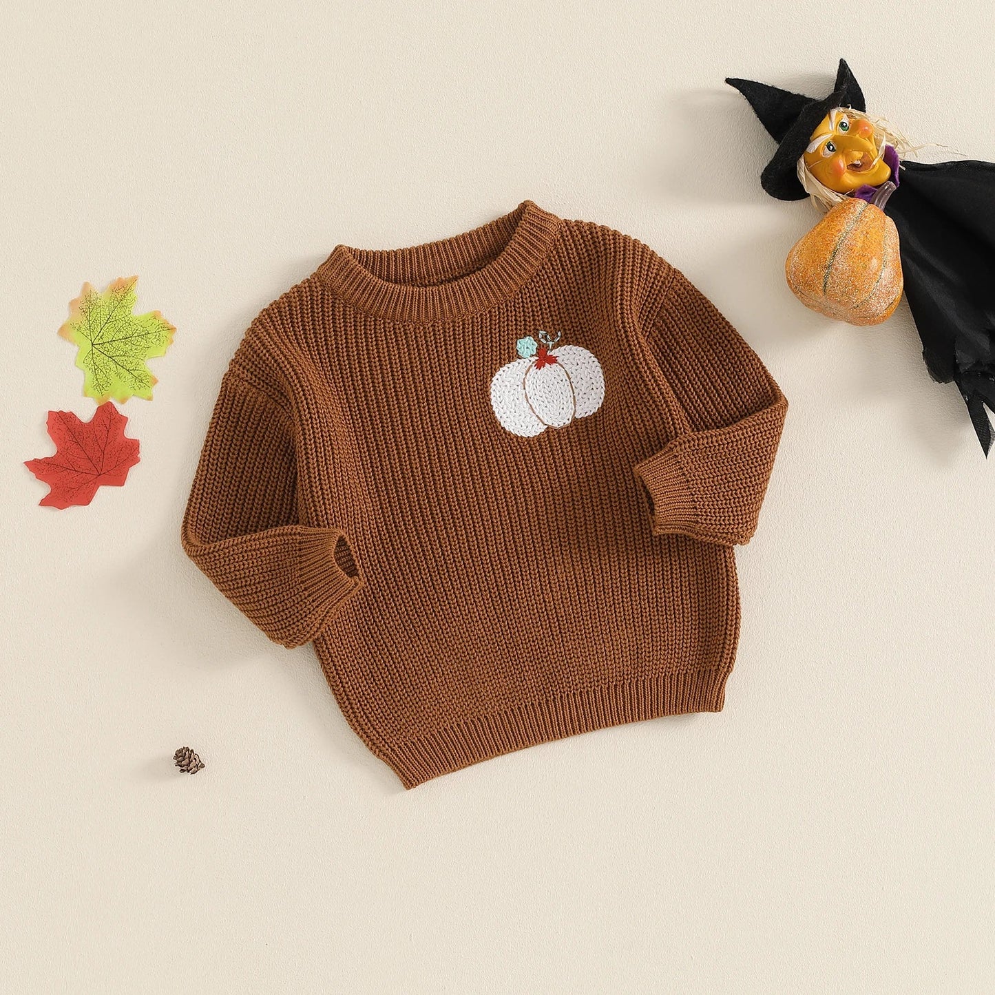 Kids orange Halloween knit sweater with long sleeves featuring pumpkin and ghost embroidery