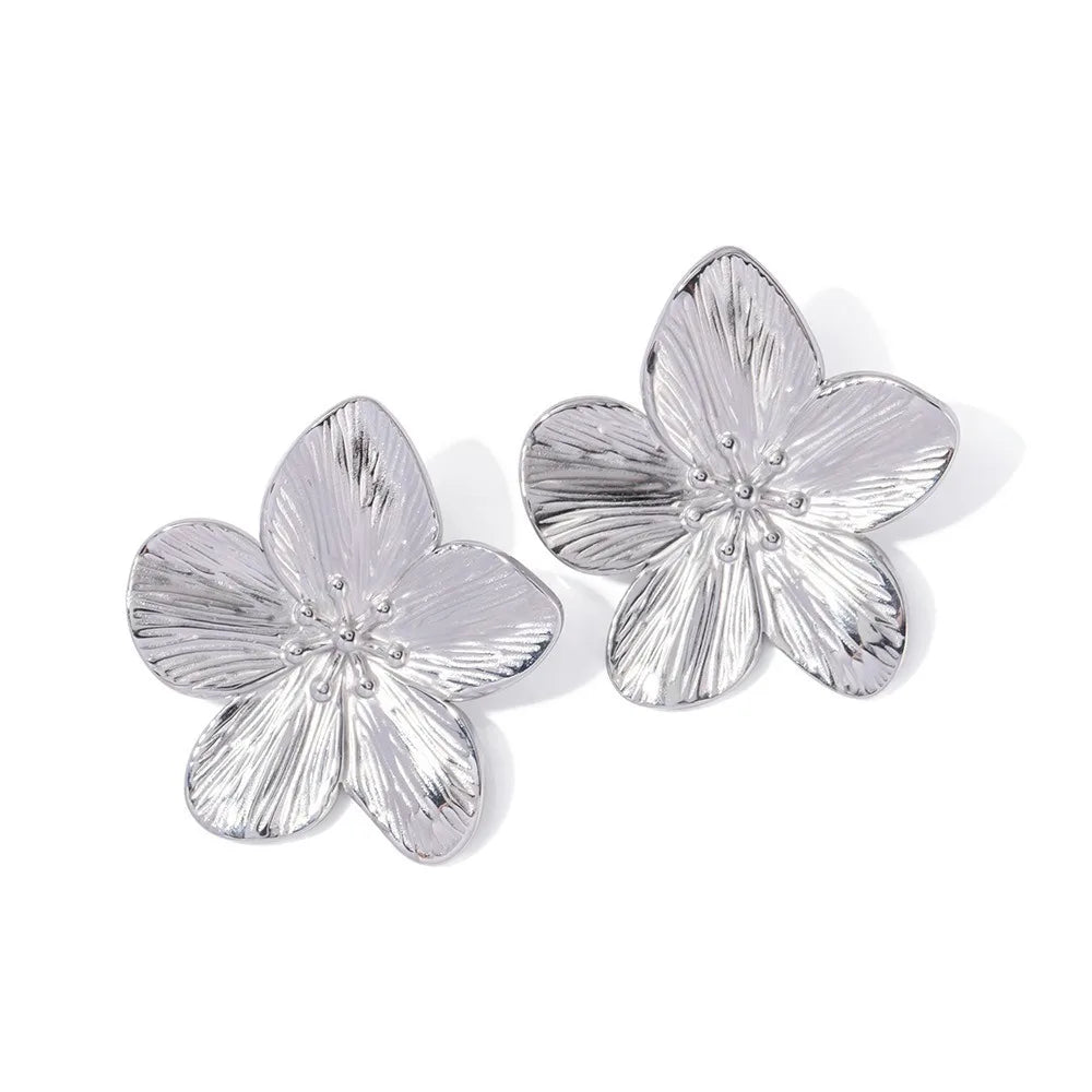 Autumn oversized floral statement earrings with gold-tone textured petal veining and bold feminine silhouette