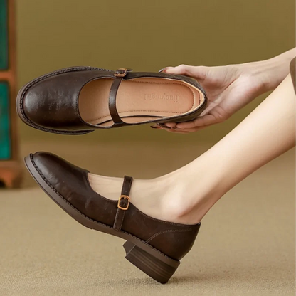 Women's black leather Mary Jane shoes low block heel single strap classic polished silhouette