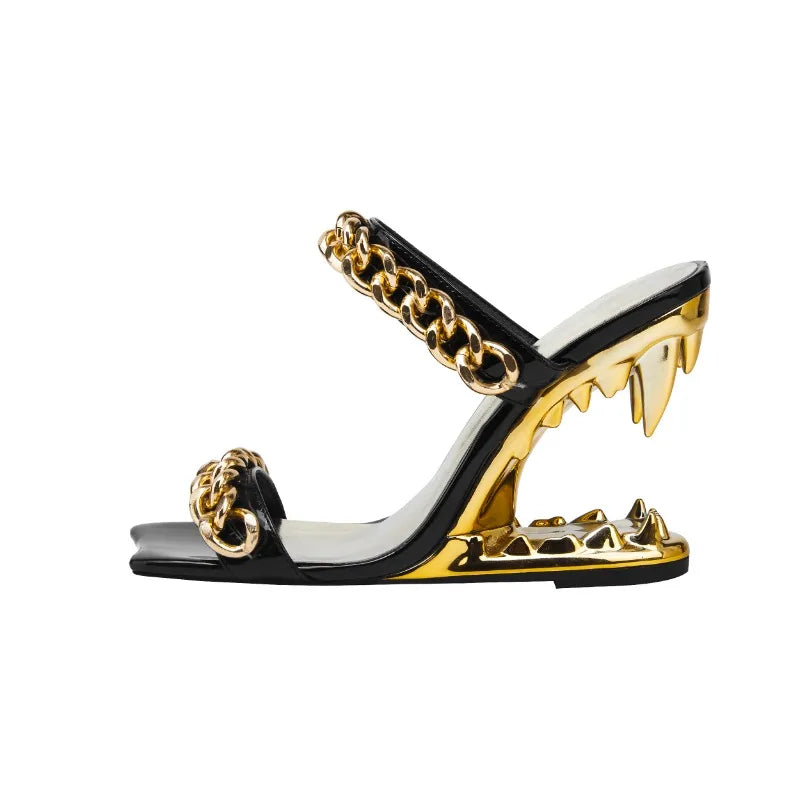 Black slingback heels with sculpted tiger teeth heel and gold chain detailing for bold evening style