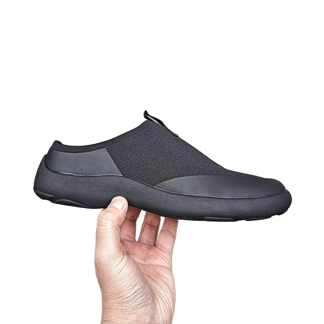 Wavlynn Mono Tabi Slip-On minimalist sneaker with bold split-toe silhouette in clean neutral tones