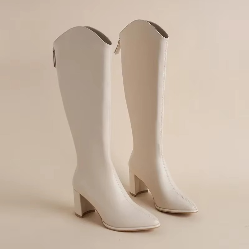 Plus size women's knee-high boots in black with chunky heel and side zipper closure