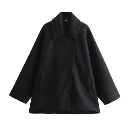 Women's oversized winter coat in cozy neutral tones, relaxed silhouette with premium insulation for layering