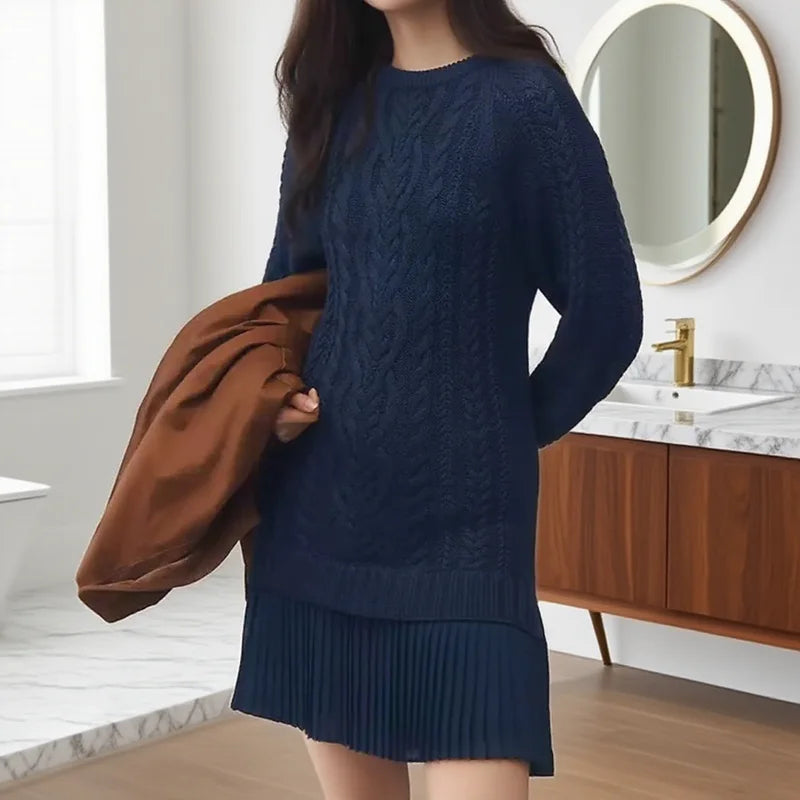 Cozy knit sweater dress with flattering silhouette and distinctive modern design details