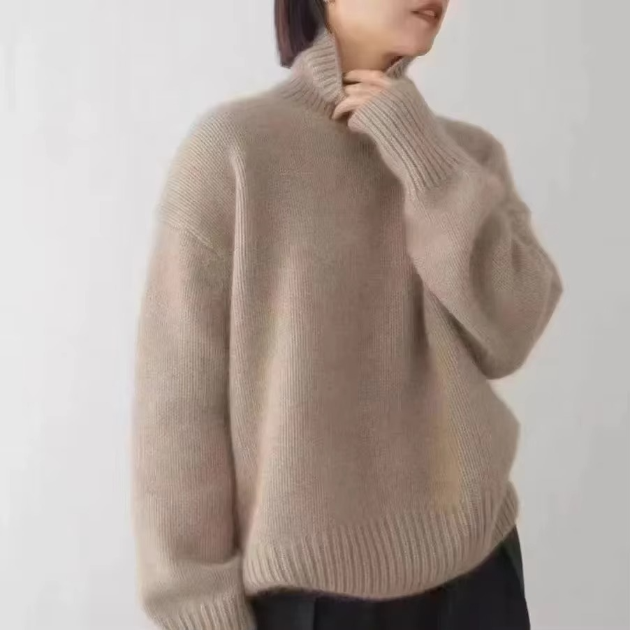 Women's high neck knit sweater loose fit cozy polyester blend modern relaxed silhouette