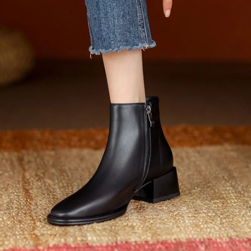 Sophia black vegan leather ankle boots with chunky block heel, pointed toe, and side zipper closure
