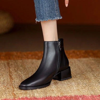Sophia black vegan leather ankle boots with chunky block heel, pointed toe, and side zipper closure