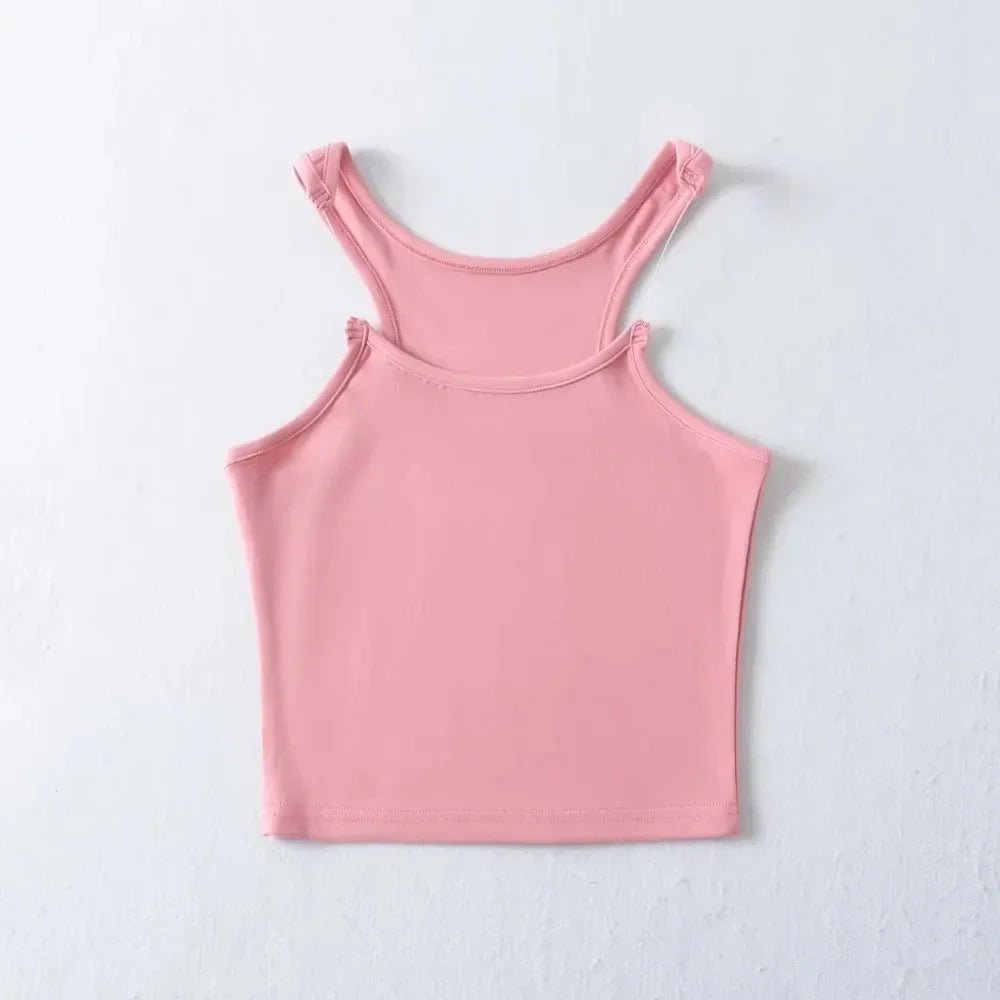White sleeveless tank top with invisible straps, slimming fit, lightweight breathable fabric for layering