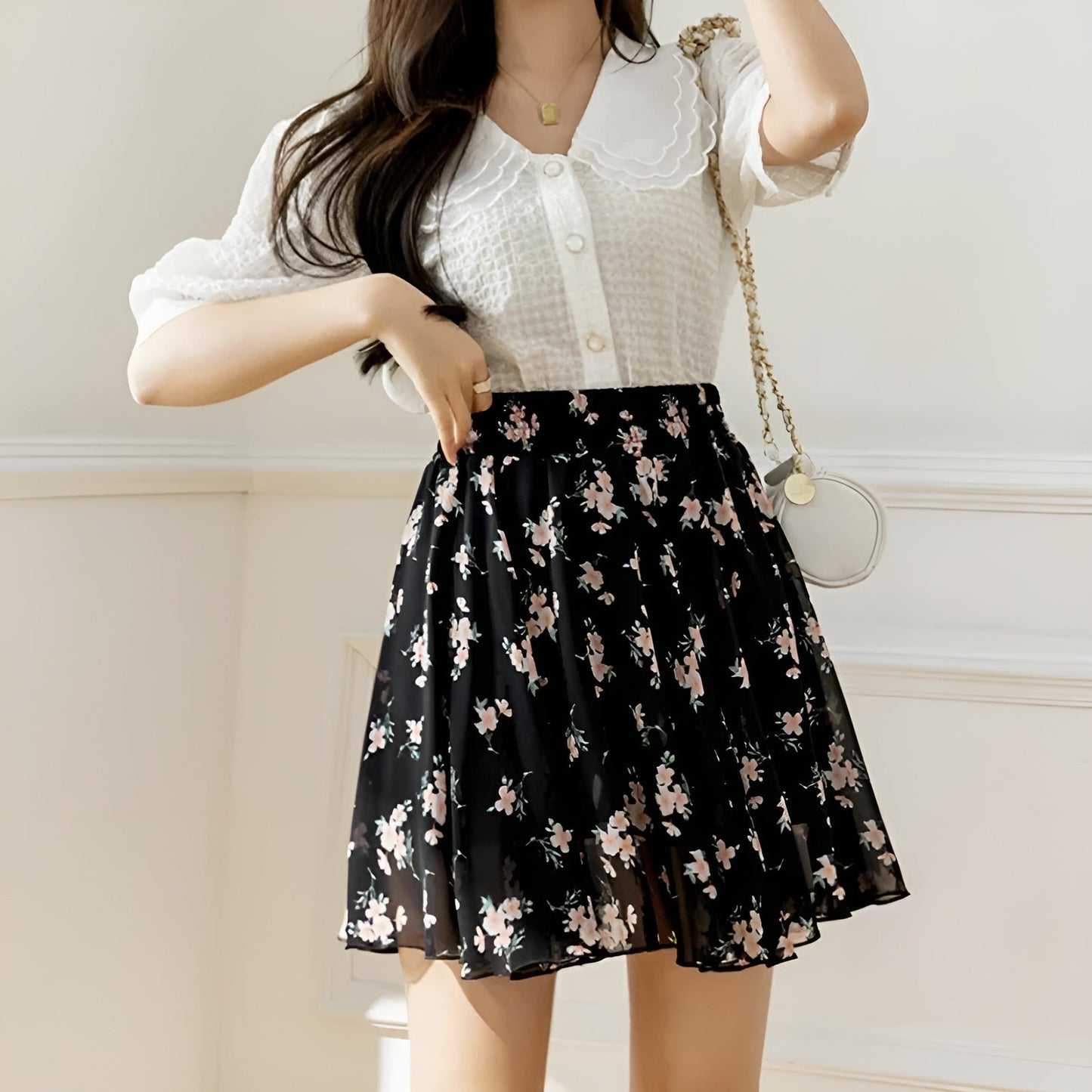 Floral chiffon mini skirt with high cinched waist and dainty pleated free-flare silhouette