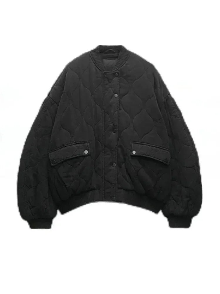 Black quilted bomber jacket relaxed loose fit with button zipper closure and round neck design