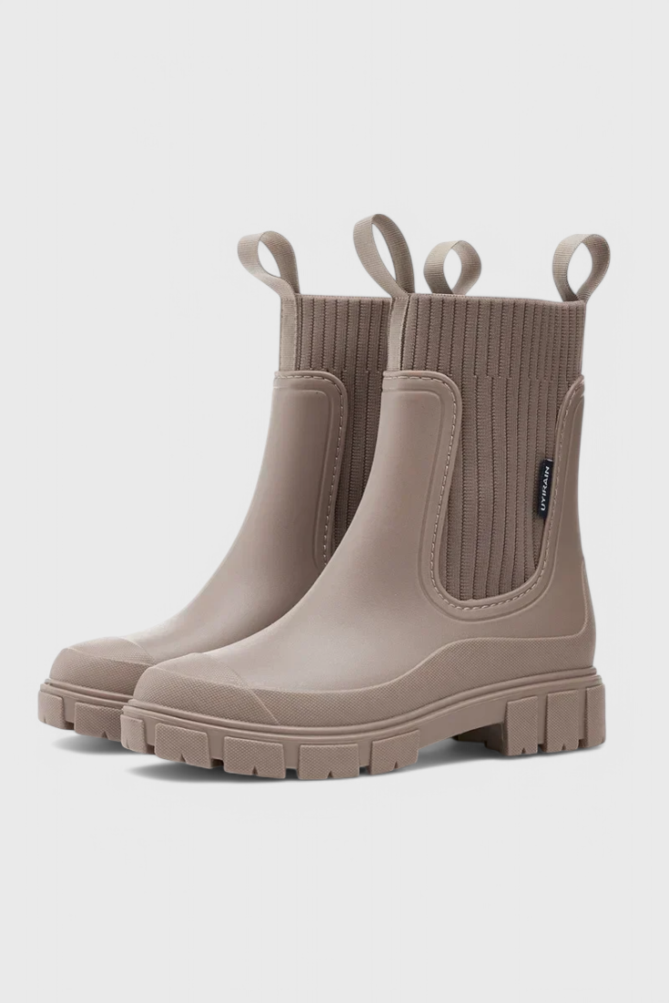 Black waterproof Chelsea boots sleek streamlined silhouette with elastic side panels for all-weather style
