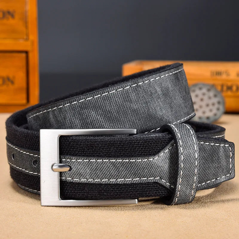 Men's rugged denim belt with full-grain leather reinforcement and solid metal buckle in classic style