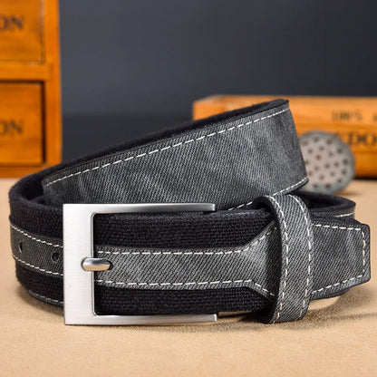 Men's rugged denim belt with full-grain leather reinforcement and solid metal buckle in classic style