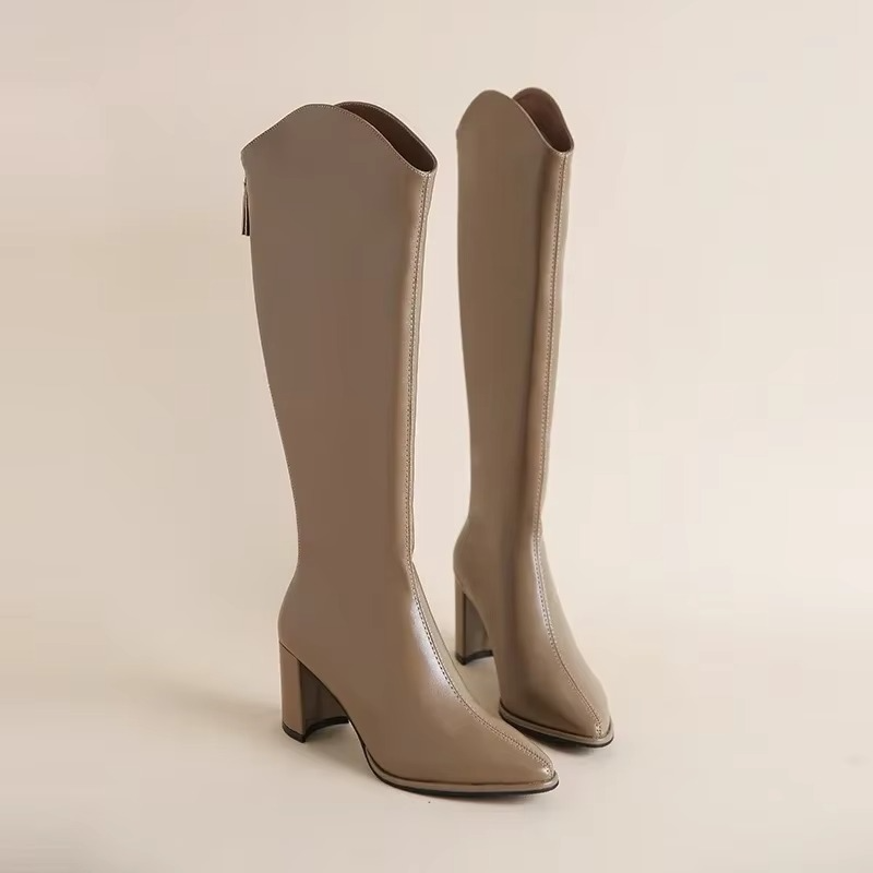 Plus size women's black knee-high boots with thick block heel and side zipper closure