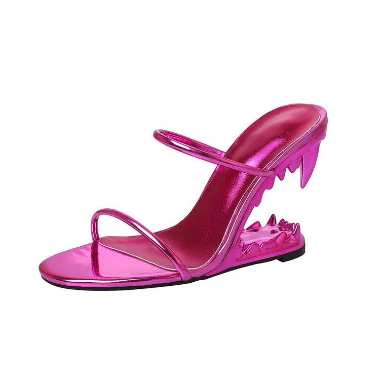 Black slingback heels with sculpted tiger teeth heel and gold chain detailing for bold evening glamour