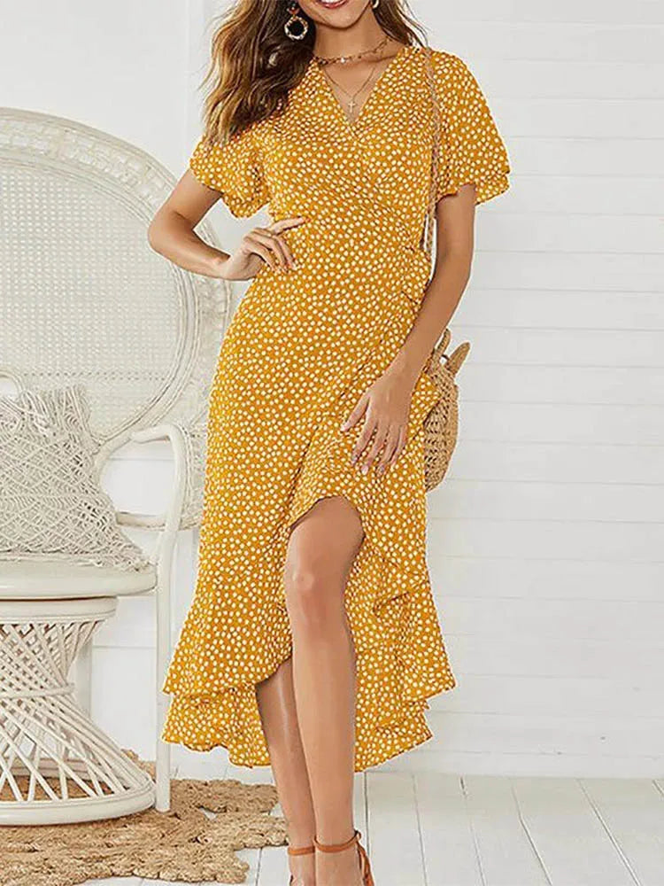 Floral maxi summer dress for women with V-neckline, ruffle accents, and elegant side slit