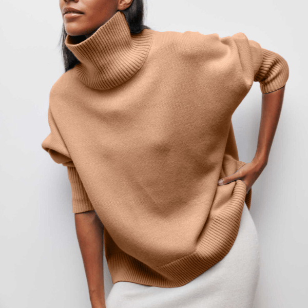 Cream wool-blend turtleneck sweater with high ribbed neck and voluminous relaxed fit