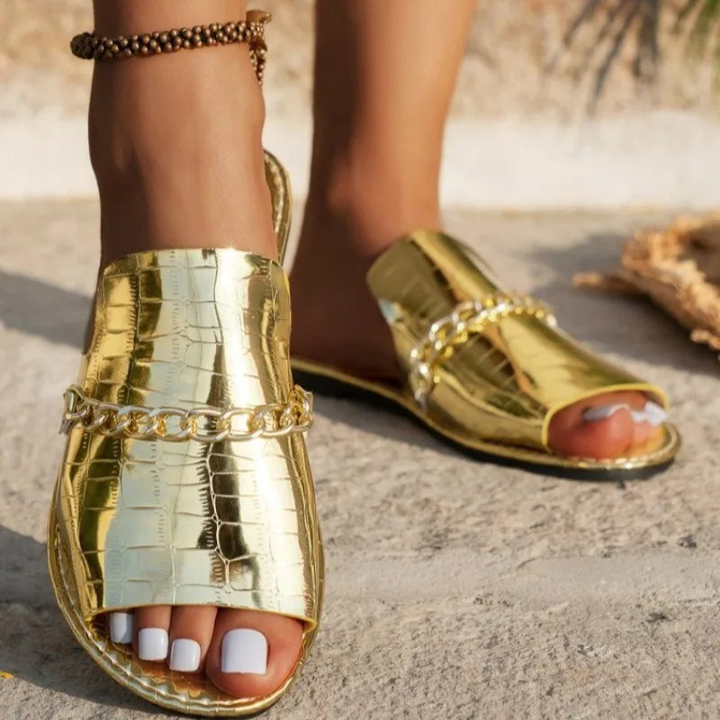 Women's croc-embossed sandals in neutral tone, sleek silhouette with quiet luxury finish