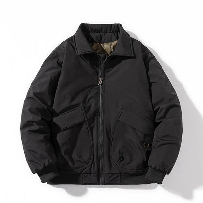 Black quilted bomber jacket with bulky streetwear fit, cargo pockets, ribbed cuffs, and windbreaker exterior