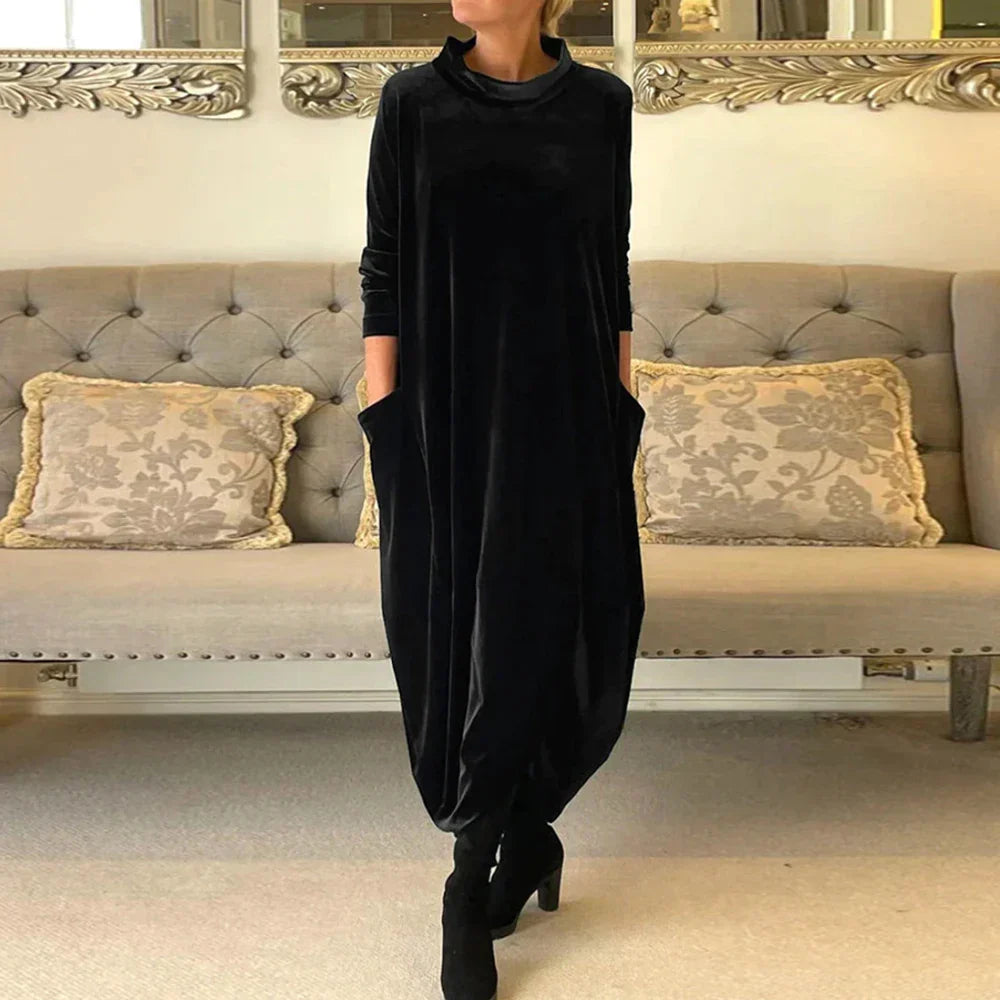 Elegant flowing tunic in soft neutral tones with flattering silhouette and breathable lightweight fabric
