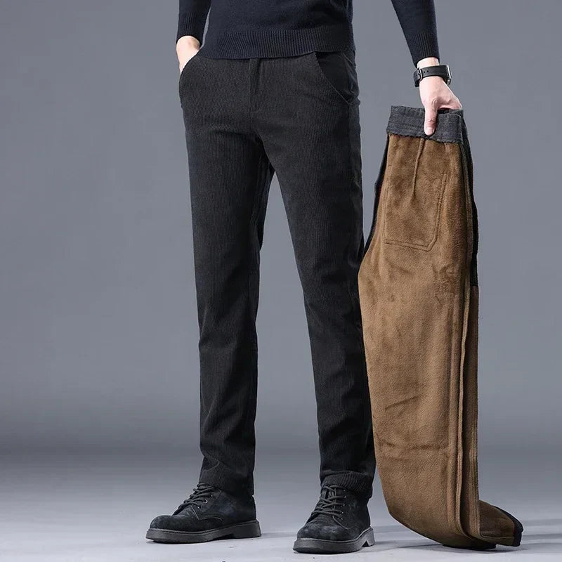 Men's fleece-lined winter pants in neutral tones, slim fit with insulated lining for cold weather outdoor use