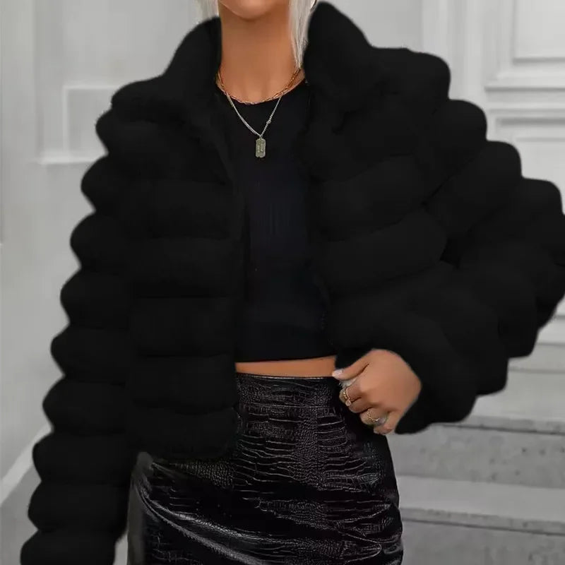 Ivory faux fur short coat with plush texture, modern silhouette, and luxurious cozy warmth