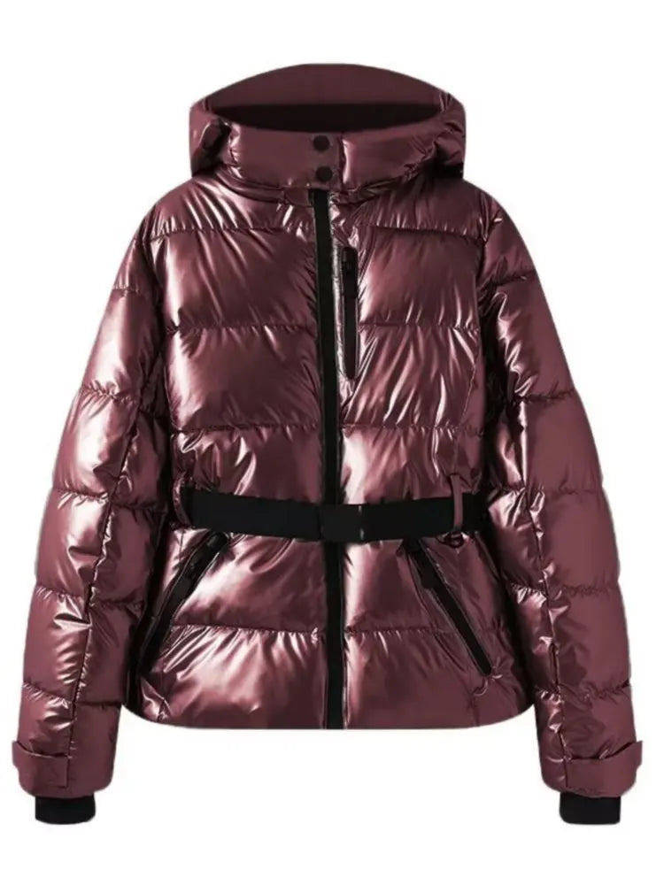 Women's metallic puffer jacket with belted waist, cozy winter fit, and sleek flattering silhouette