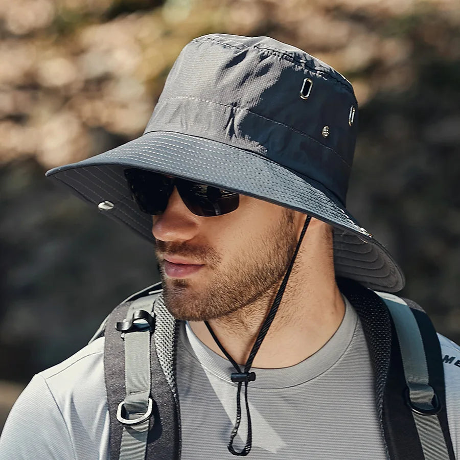 SunGuard lightweight packable hat with breathable perforations, floatable brim, and adjustable drawstring