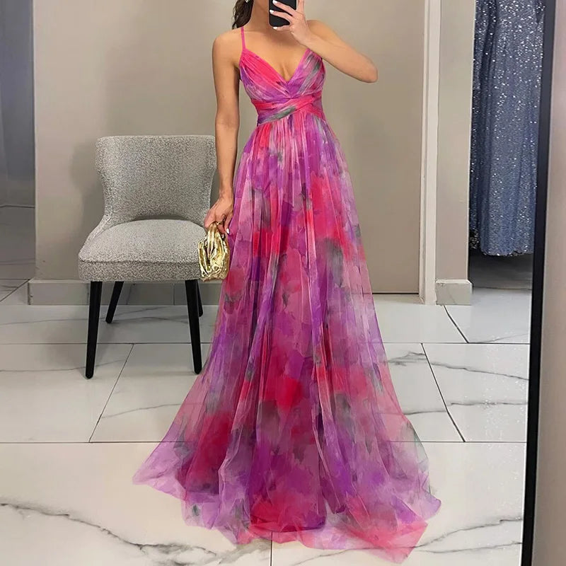 Floral chiffon maxi dress in romantic multicolor print with pleated skirt and adjustable back closure