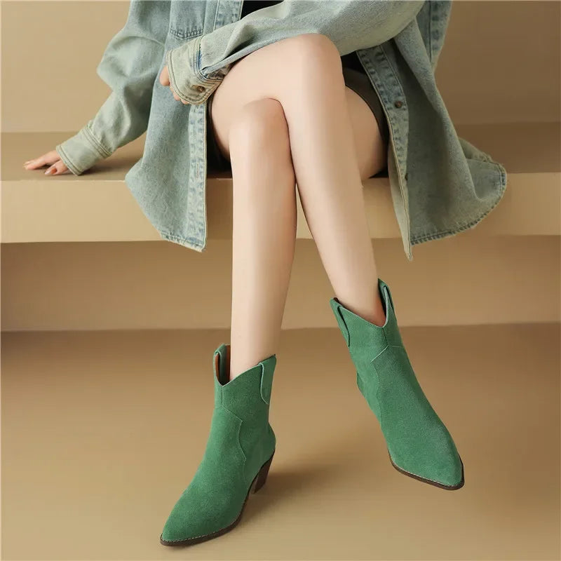 Warm brown faux suede western ankle boots with pointed toe and sleek city-ready silhouette