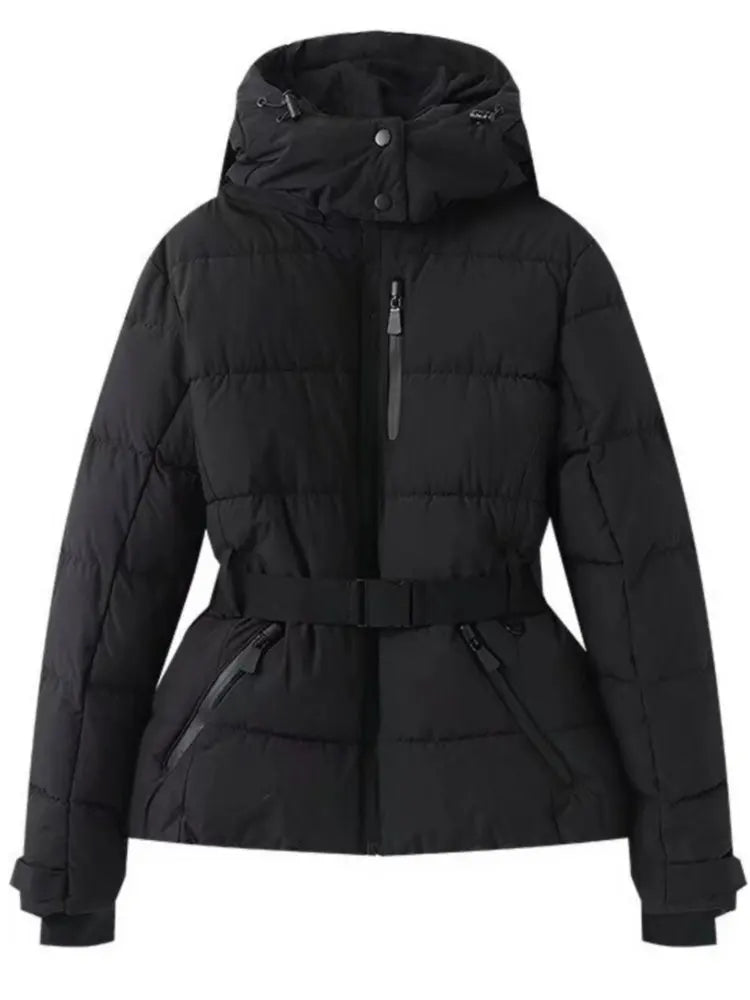 Women's metallic silver belted puffer jacket with cinched waist and cozy winter warmth