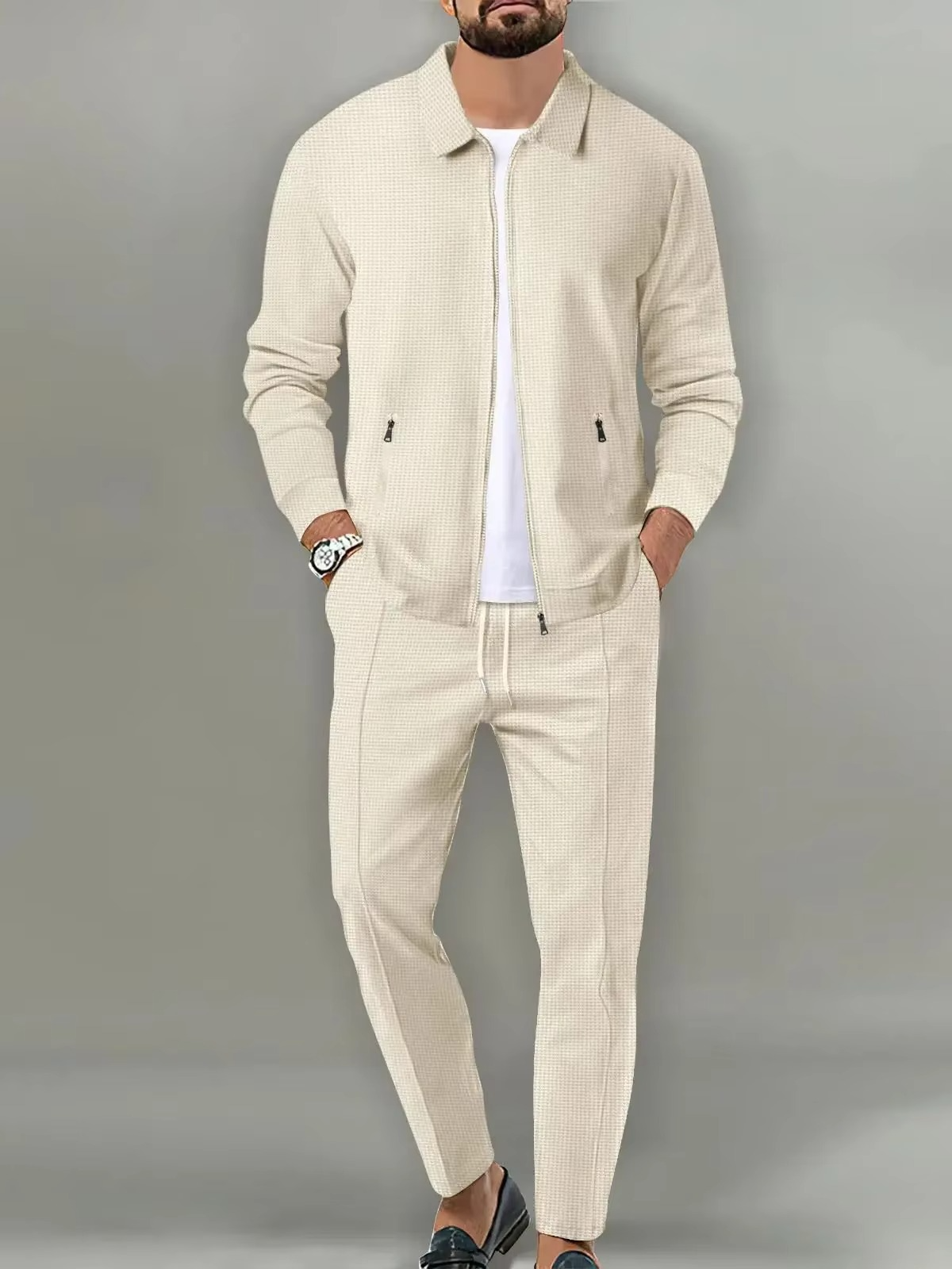 Men's two-piece polo jacket shirt and matching drawstring pants set in coordinated everyday style