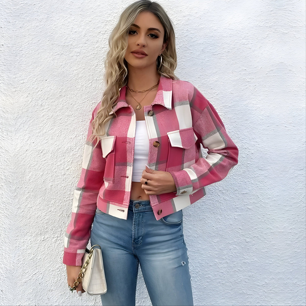 Cropped plaid-wash jacket with faux horn buttons, patch pockets, turn-down collar, and relaxed fit