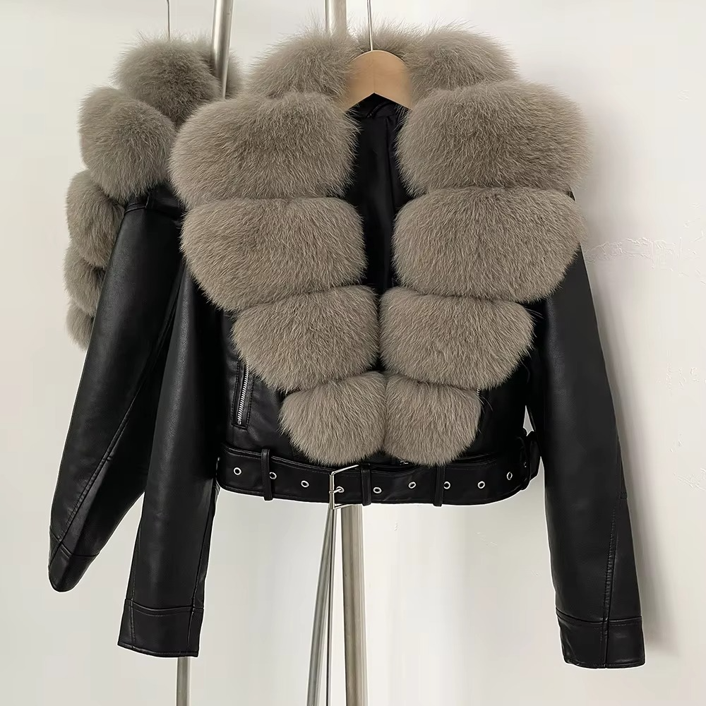 Women's black faux leather coat with plush faux fur collar, elegant long-line silhouette