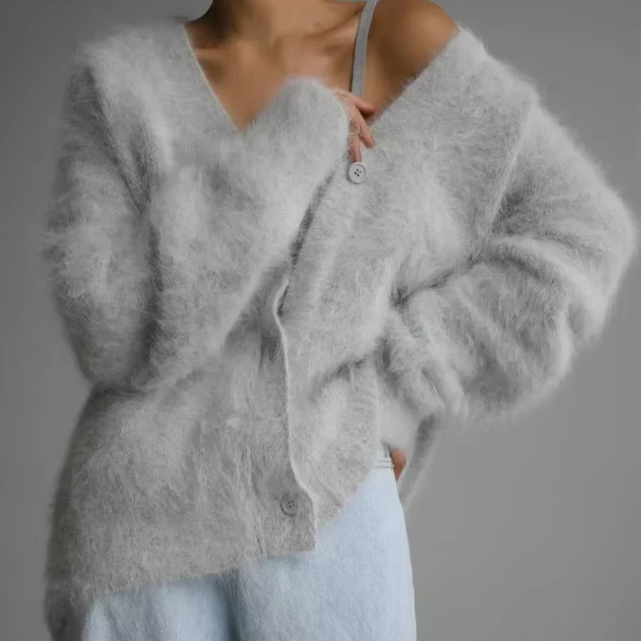 Women's oversized knit cardigan in cozy V-neck button-down style with plush draped silhouette