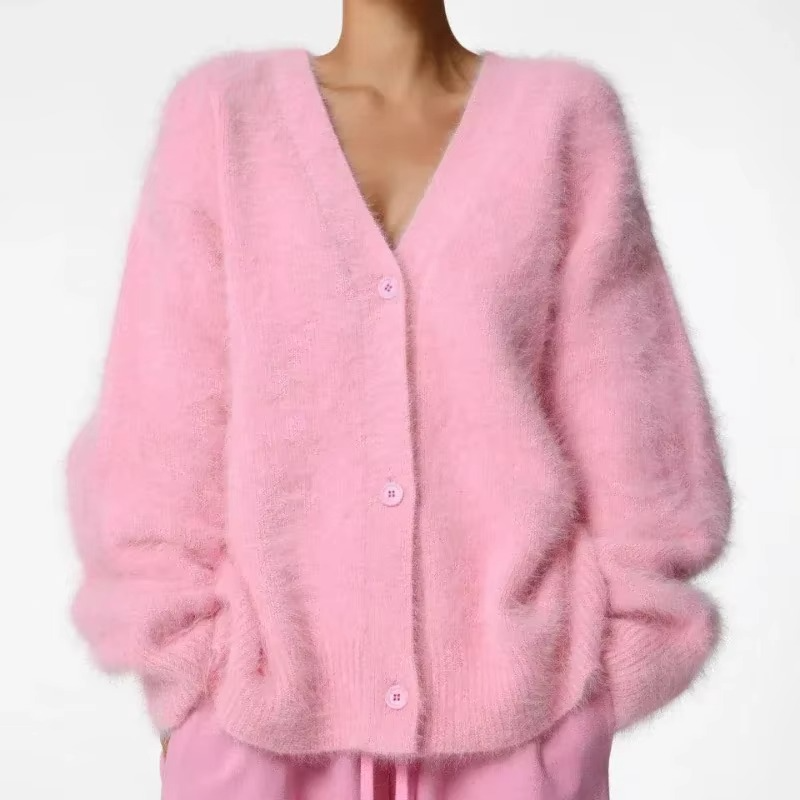 Women's oversized knit cardigan sweater coat in cozy V-neck button-down style with plush textured fabric