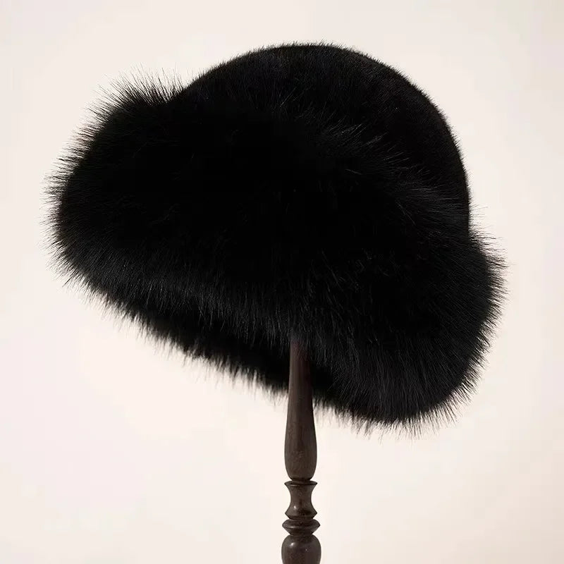 Beige rounded silhouette solid fur hat with plush furry texture for elegant winter style
