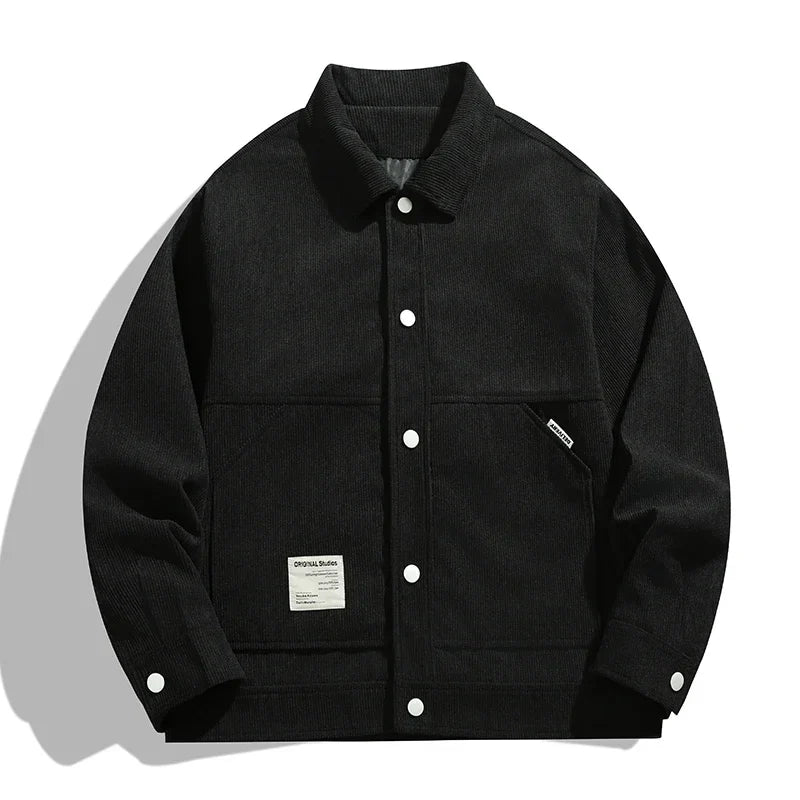 Retro 90s brown corduroy trucker jacket with turn-down collar and classic structured silhouette