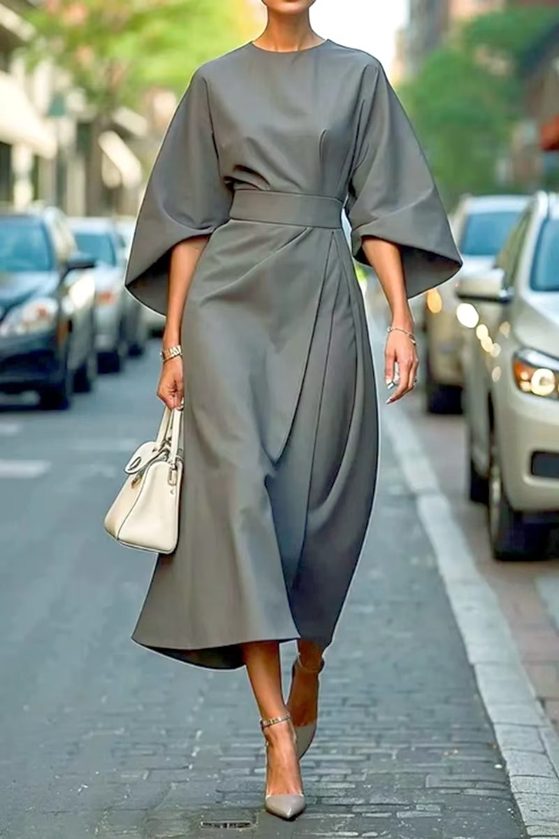 Solid color bat sleeve dress with cinched waist, elegant midi silhouette for modern women