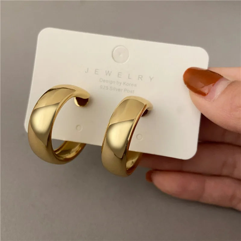 Chunky gold hoop earrings highly polished non-tarnish bold statement jewelry Super Hooper style