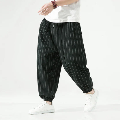 Men's white pinstripe cotton trousers relaxed fit with elastic waistband and refined stripe detailing
