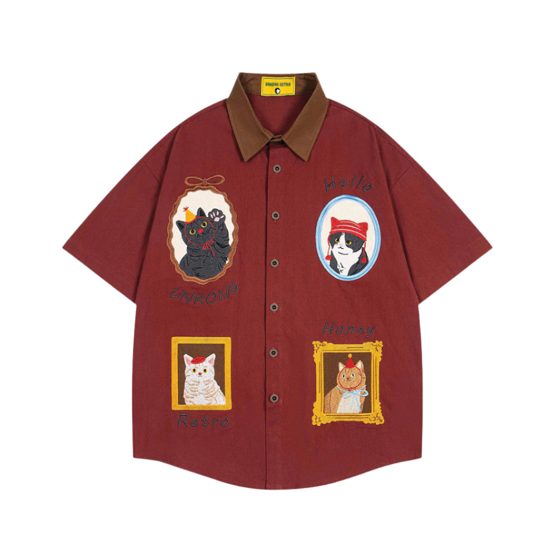 White cotton regular fit button-up shirt with playful cat embroidery and turn-down collar