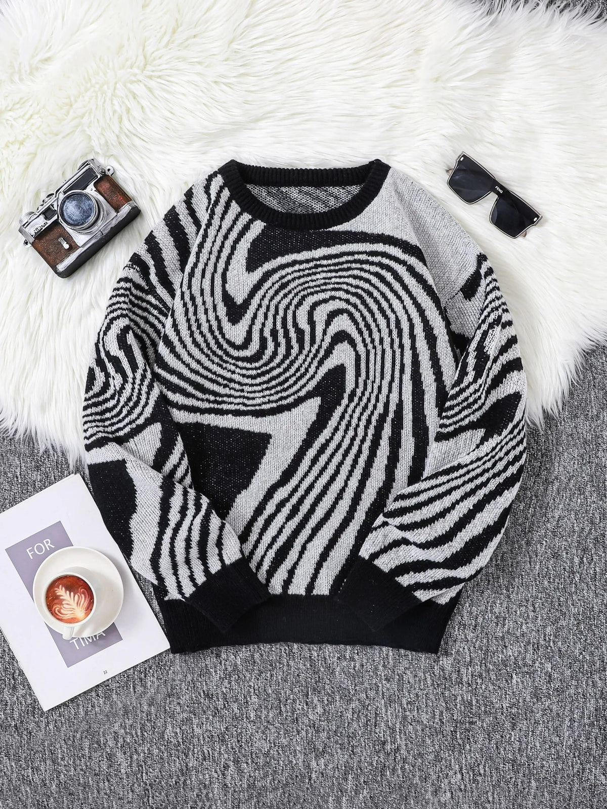 Multicolor abstract jacquard wool pullover with maze-inspired pattern, relaxed silhouette, and ribbed cuffs