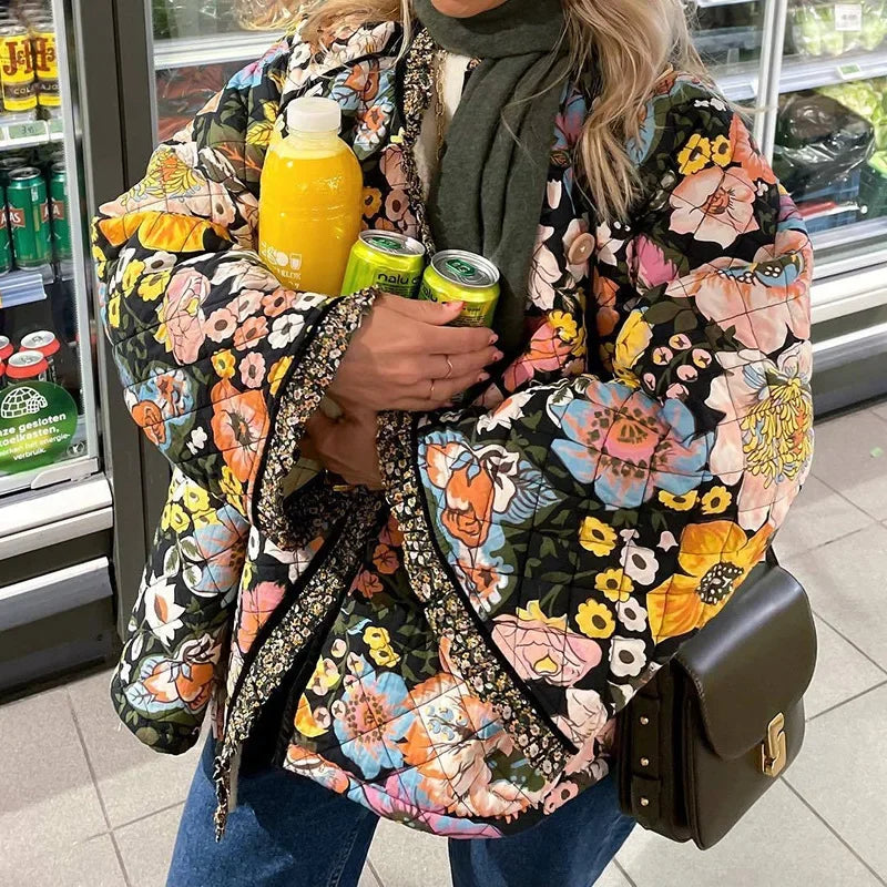 Women's floral quilted coat fleece-lined warm winter outerwear with vibrant botanical print